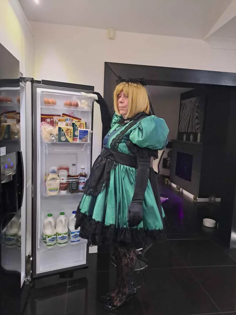 24/7 live in maid sissy barbie fetching ingredients from the fridge to prepare Mistress Lady Penelope's evening meal whilst her Mistress is at work.