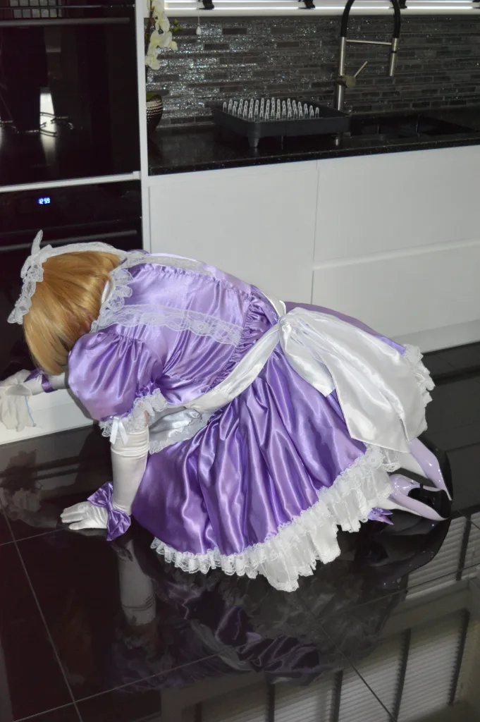 Live in maid sissy barbie in Mistress Lady Penelope's kitchen scrubbing the floor by hand.